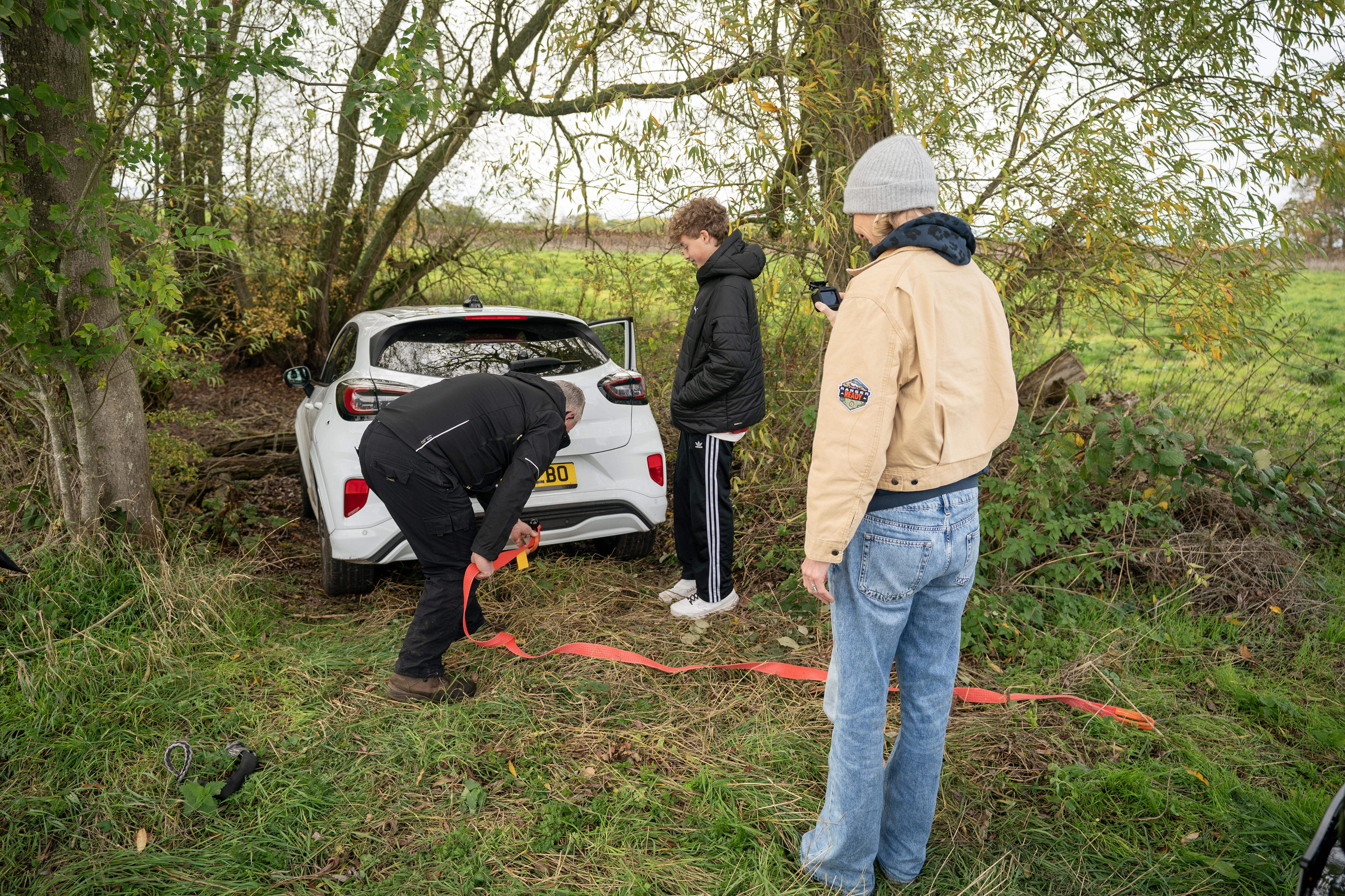 Jodie learns how to easily tow another vehicle using the Ranger PHEV. Professional driver supervision on closed course. Always consult the Owner’s Manual before off-road driving, know your terrain and trail difficulty, and use appropriate safety gear.