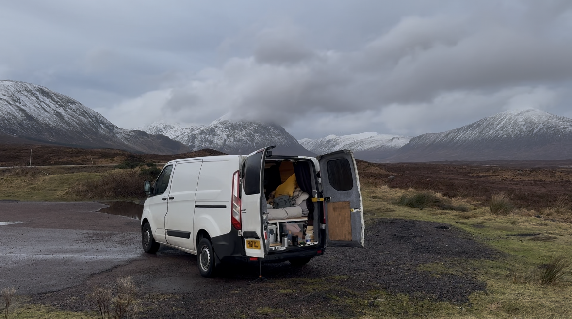 Dom Wright in the Scottish Highlands in his modified Transit home.
