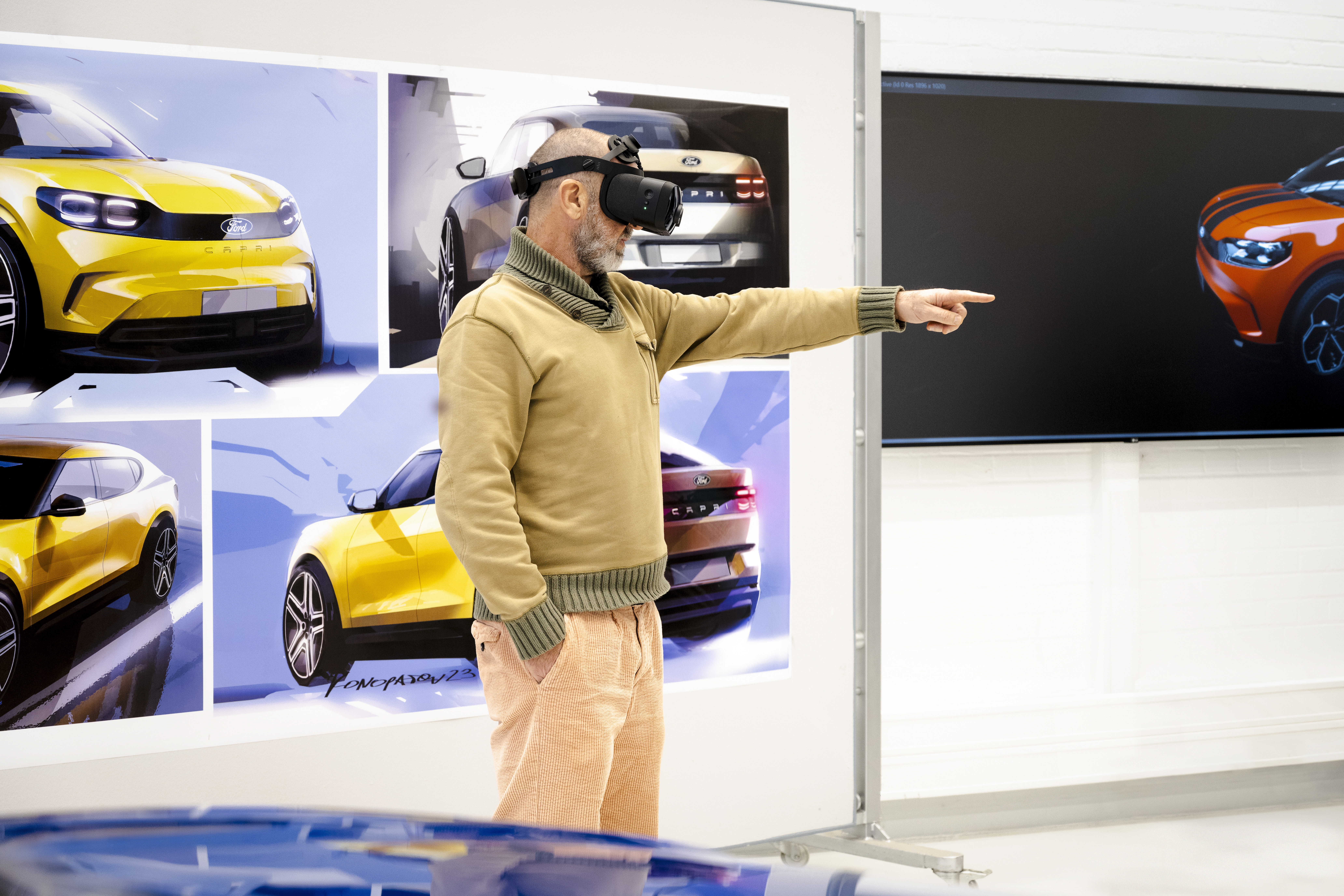 Eric Cantona at the Ford Design studio, Cologne - LICENSE BY: Ford EXPIRY DATE: Perpetuity REGION: Global SCOPE: Earned editorial, press releases, press kits All non-broadcast digital and online media All non-broadcast digital and online media, plus Retail and POS (showrooms, events etc) All print media (newspaper, magazine etc)