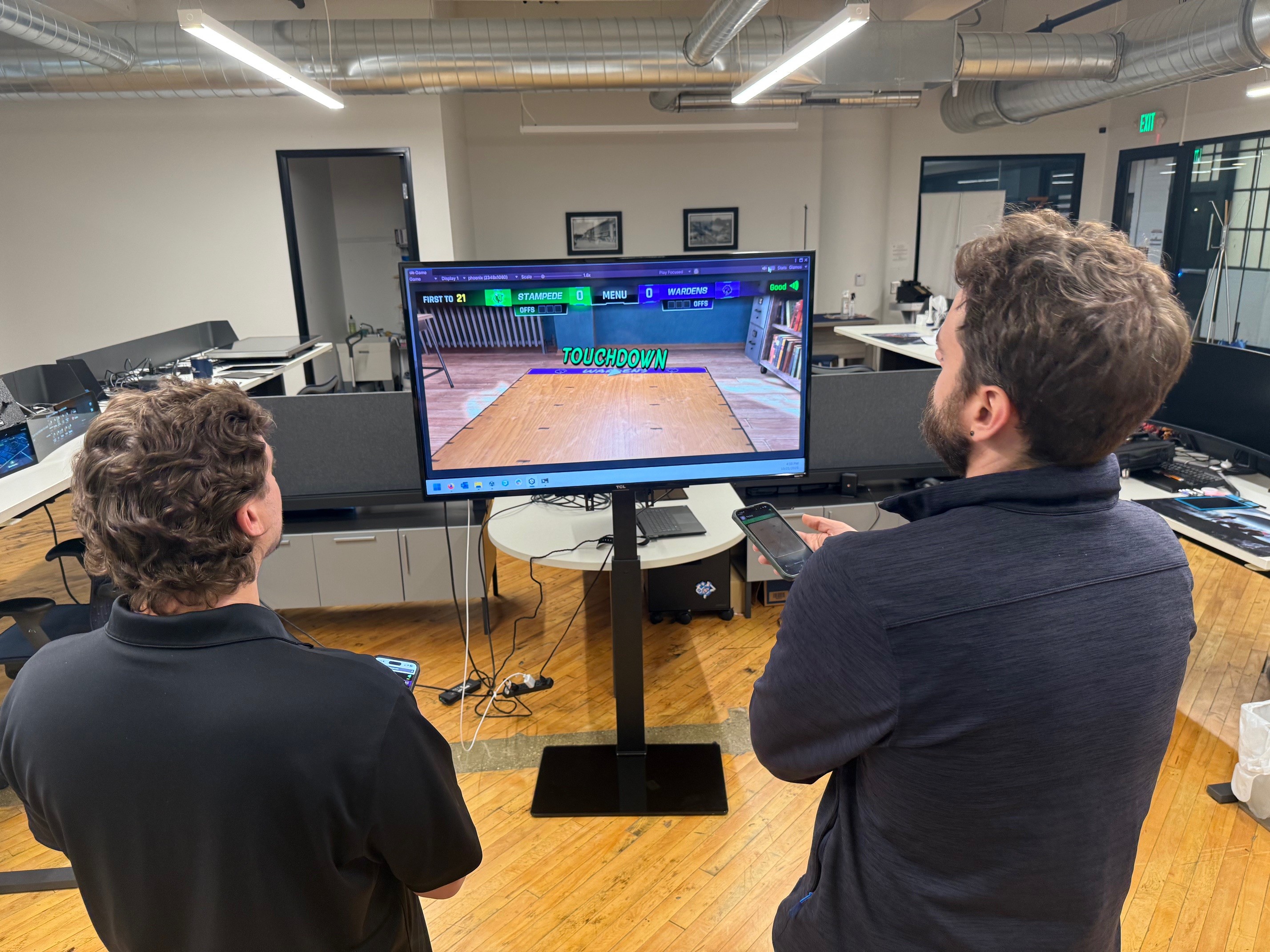 Designers test digital Paper Football game.