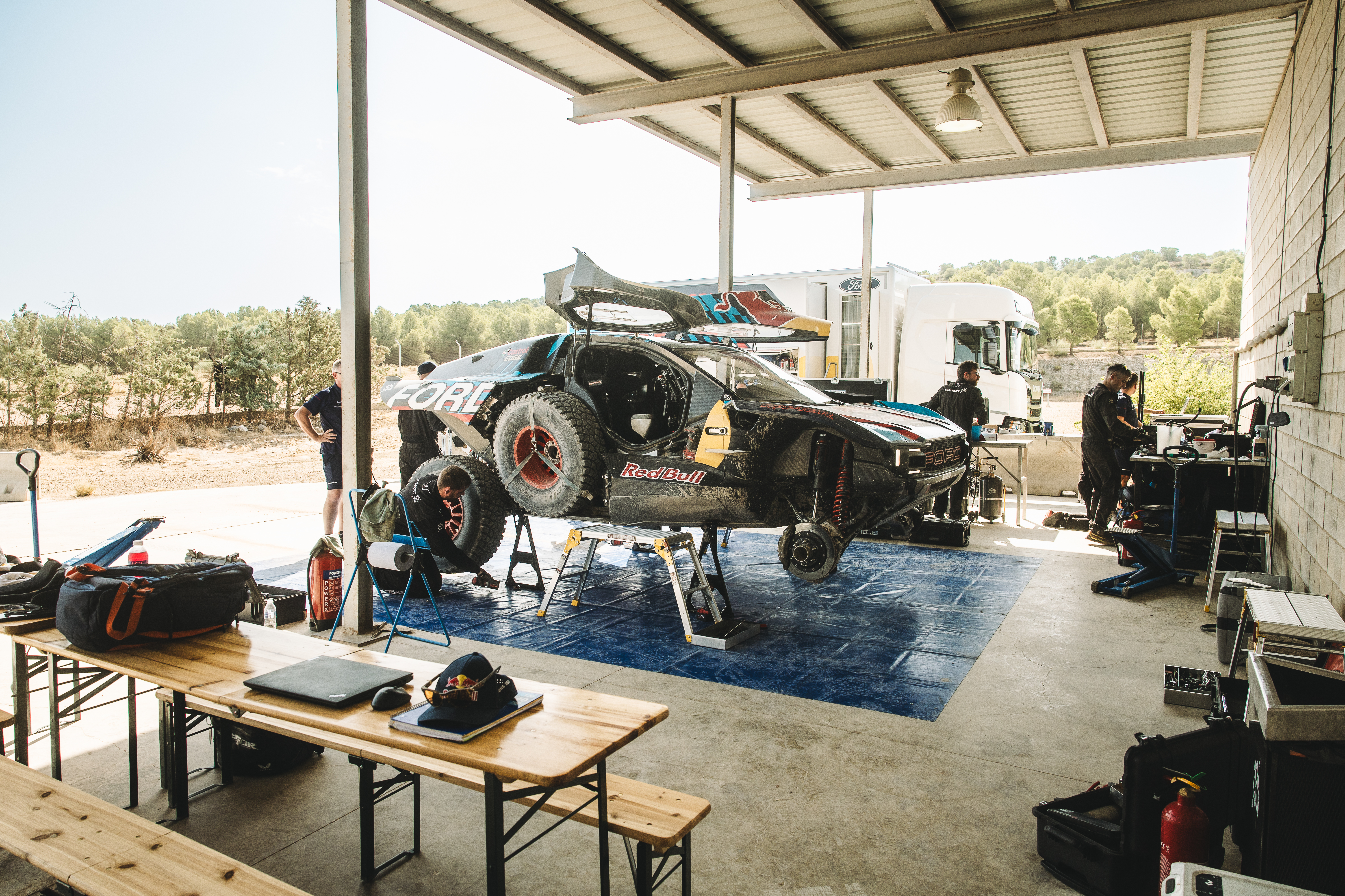 A Ford Raptor T1 being worked on before racing