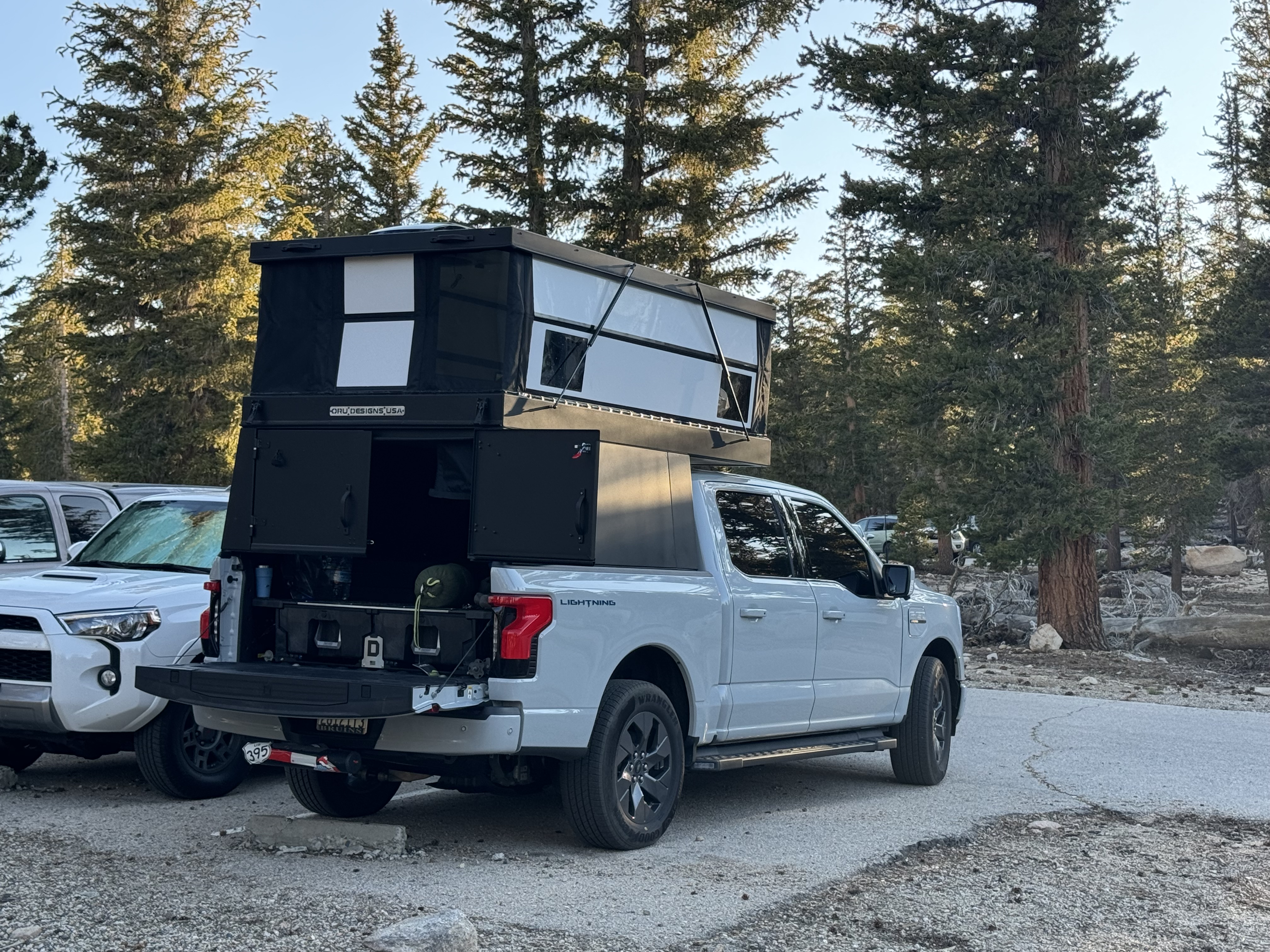 Ali R.'s F-150 Lightning truck with an aftermarket camper accessory.