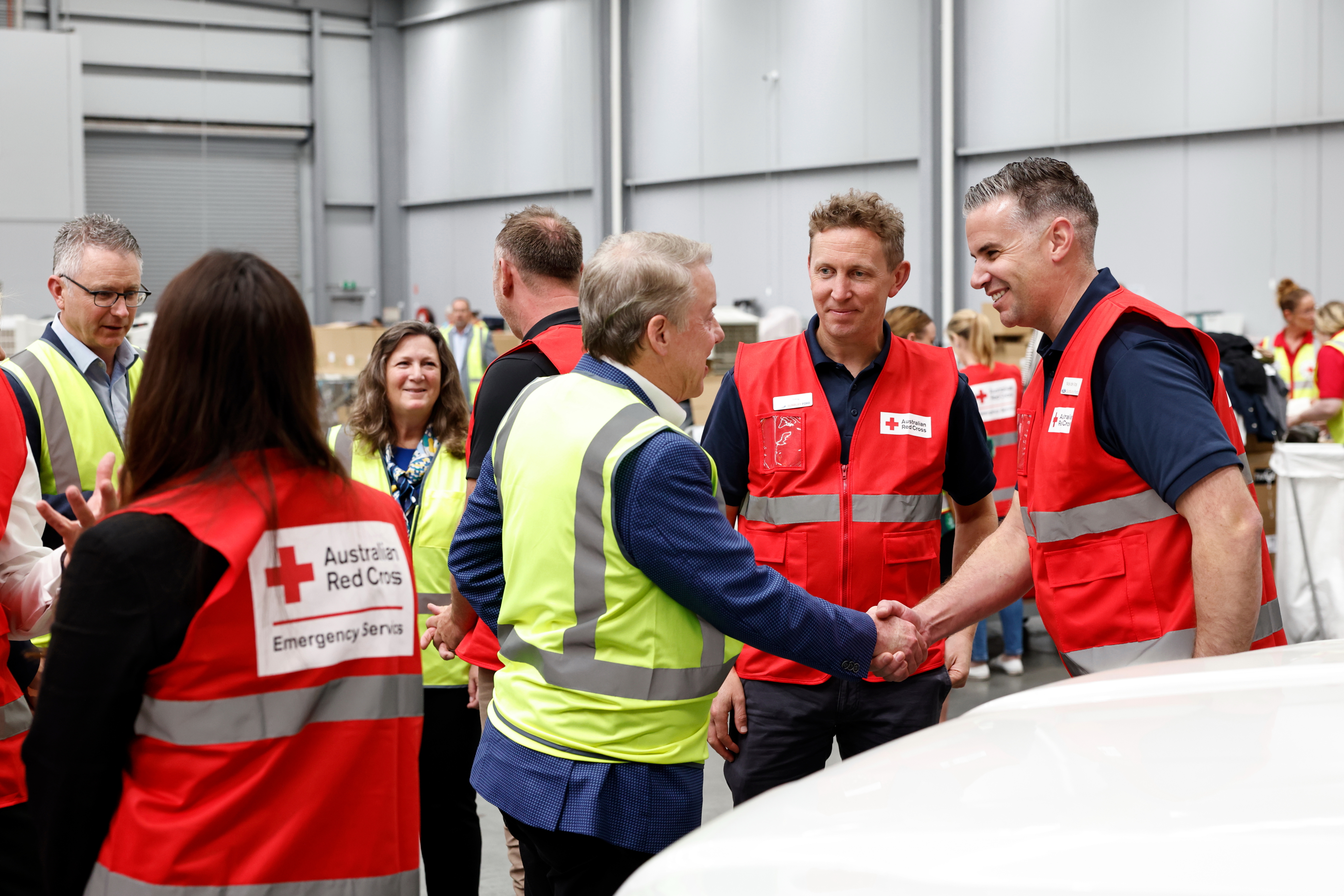 Ford chair Bill Ford Jr. with a member of the Australian Red Cross. Building on Ford's longstanding partnership with the Red Cross, Ford Australia is honored to stand alongside the Australian Red Cross, forging a new path that will strengthen disaster preparedness and recovery efforts in Australia. 