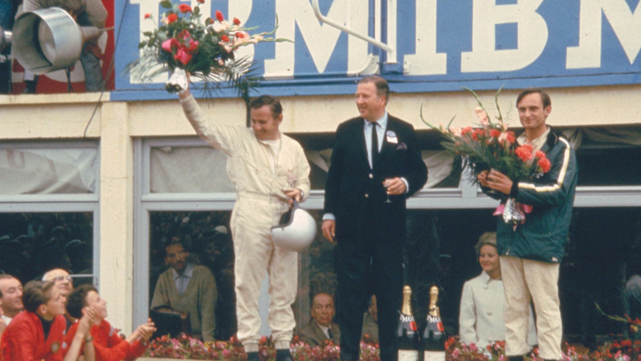 Drivers Bruce McLaren, left, and Chris Amon, right, made good on Henry Ford II’s quest to win at Le Mans.