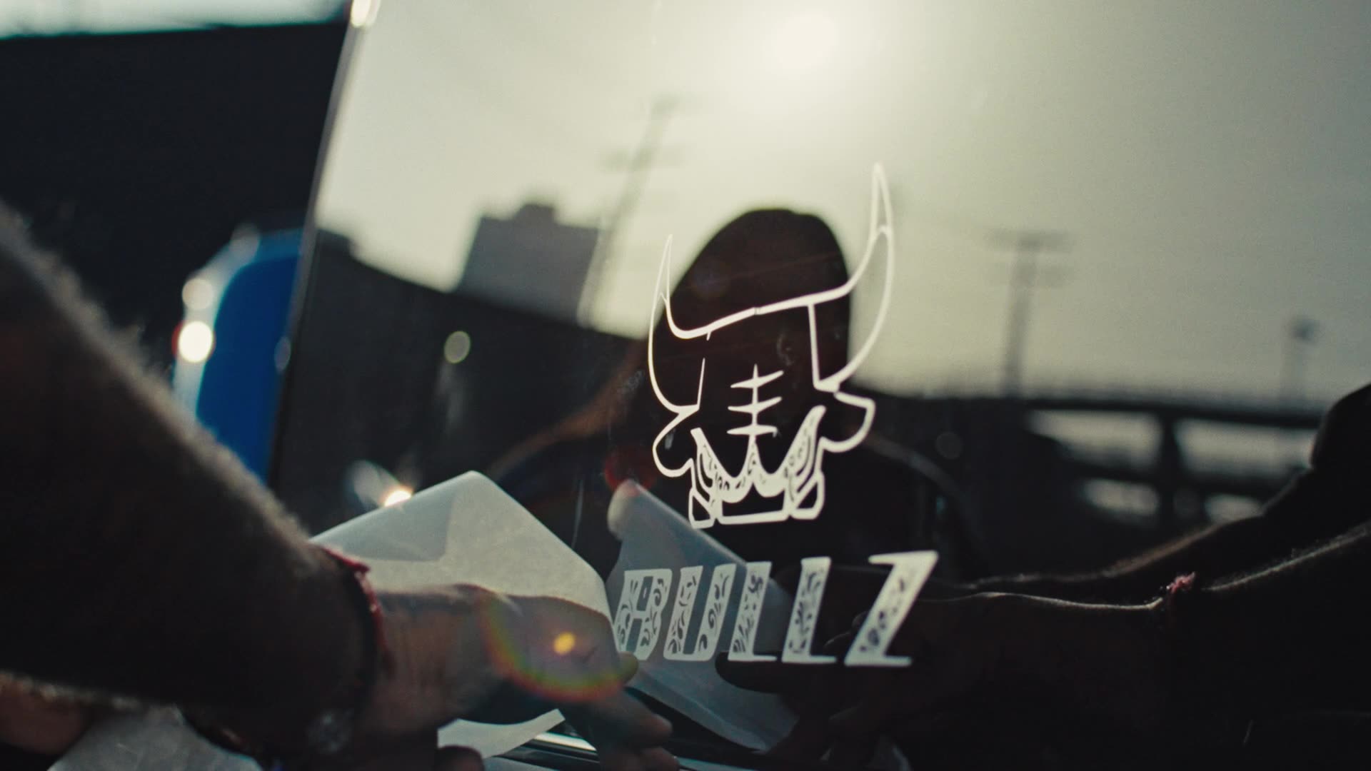 A decal on a truck window reads "BULLZ" with a bull illustration above it.