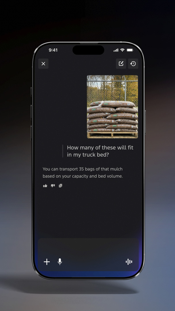A phone screen displays the AI bot's answer to the prompt.
